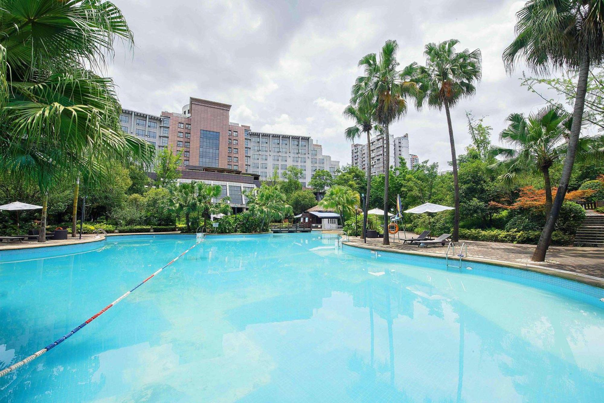 Отель Ramada Plaza By Wyndham Chongqing West Экстерьер фото
