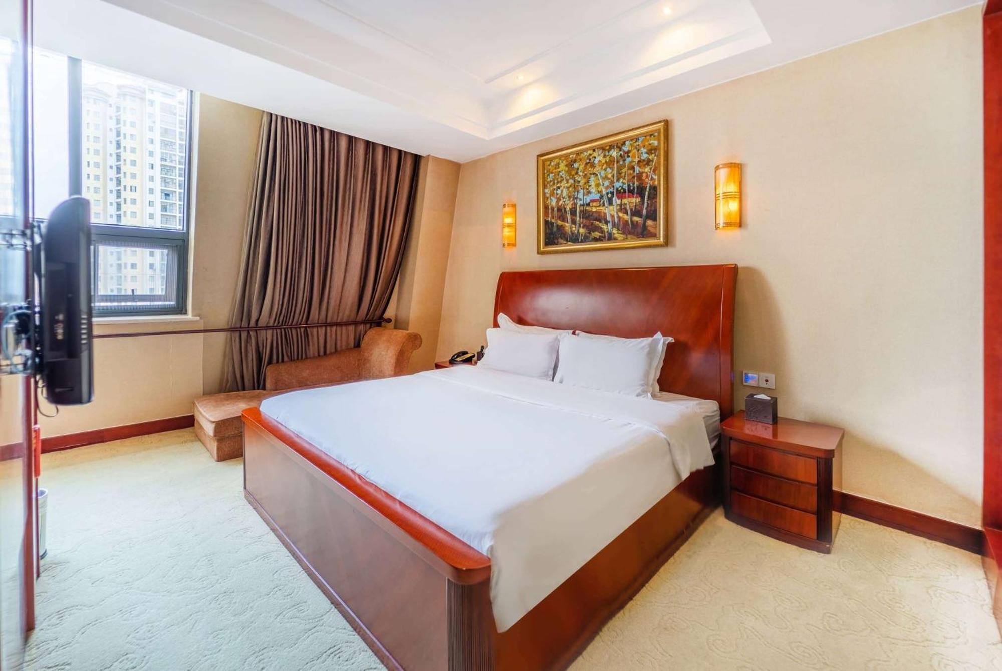 Отель Ramada Plaza By Wyndham Chongqing West Экстерьер фото