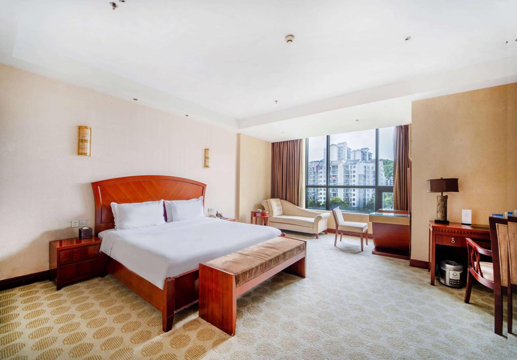 Отель Ramada Plaza By Wyndham Chongqing West Экстерьер фото