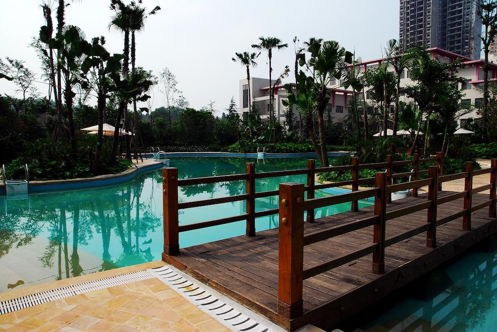 Отель Ramada Plaza By Wyndham Chongqing West Экстерьер фото